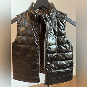 Black patent vest size 10 with cheetah print inside. Perfect conditions